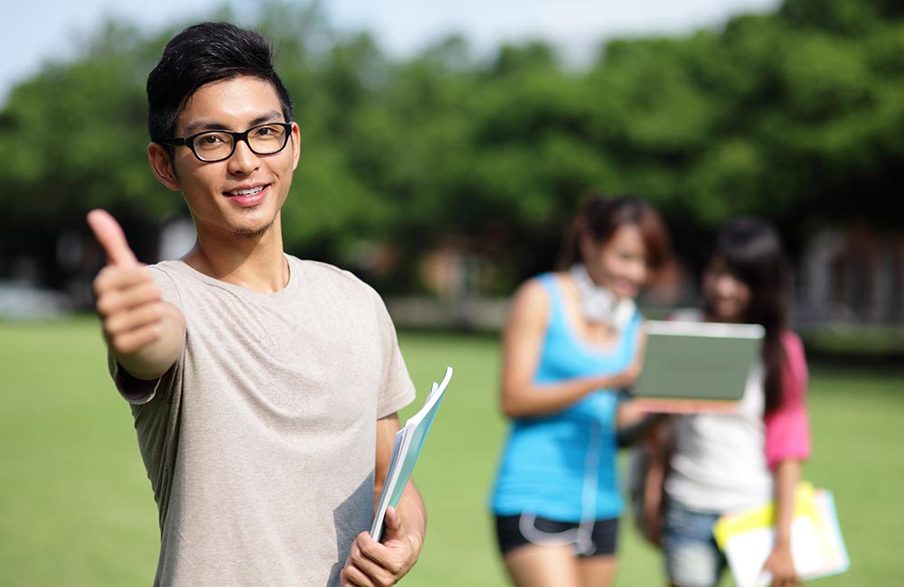 A college age male gives us a thumbs up