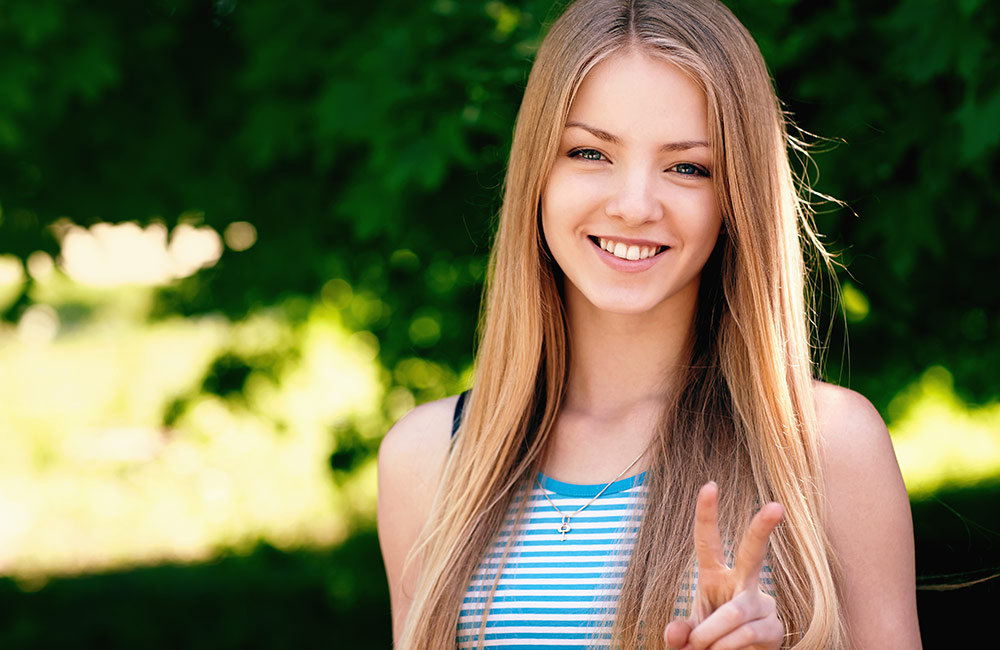 A cute young girl smiles