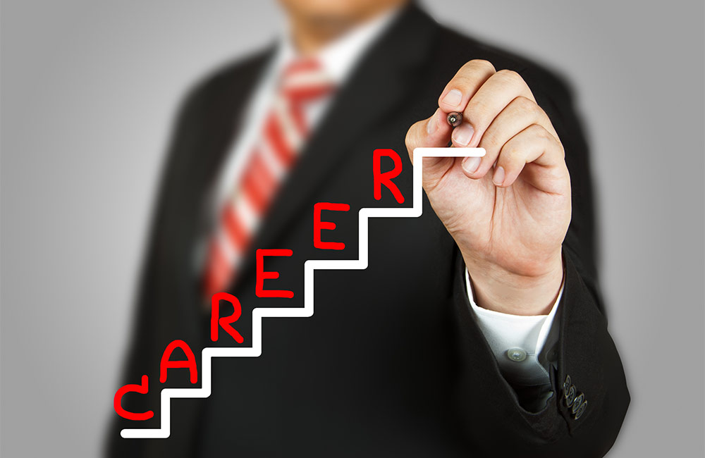 Man drawing a career ladder illustration